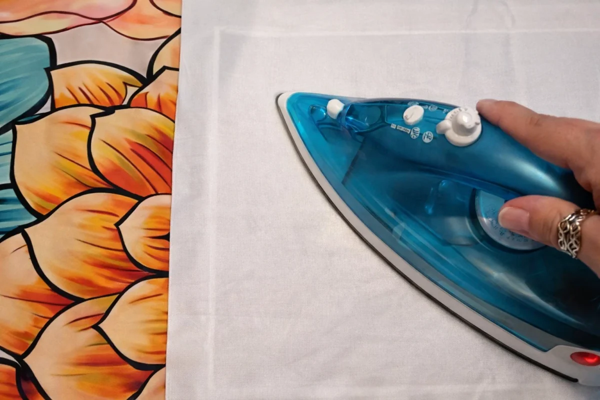 ironing a wrinkled canvas